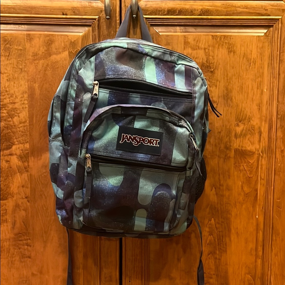 JanSport Green and Black Backpack Classic and Versatile